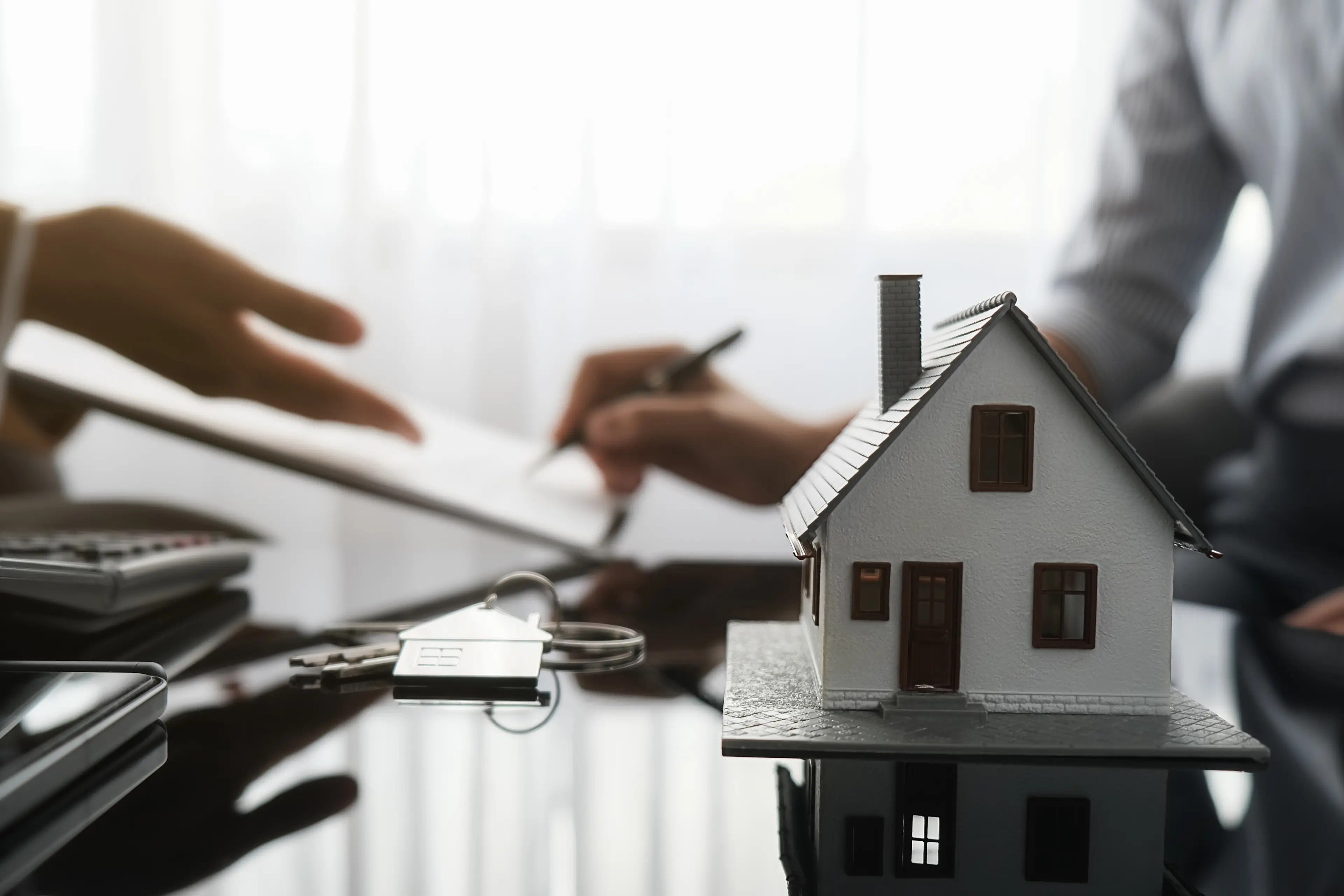 <p>Real estate agent and customer signing contract to buy house, insurance or loan real estate.</p>\\n