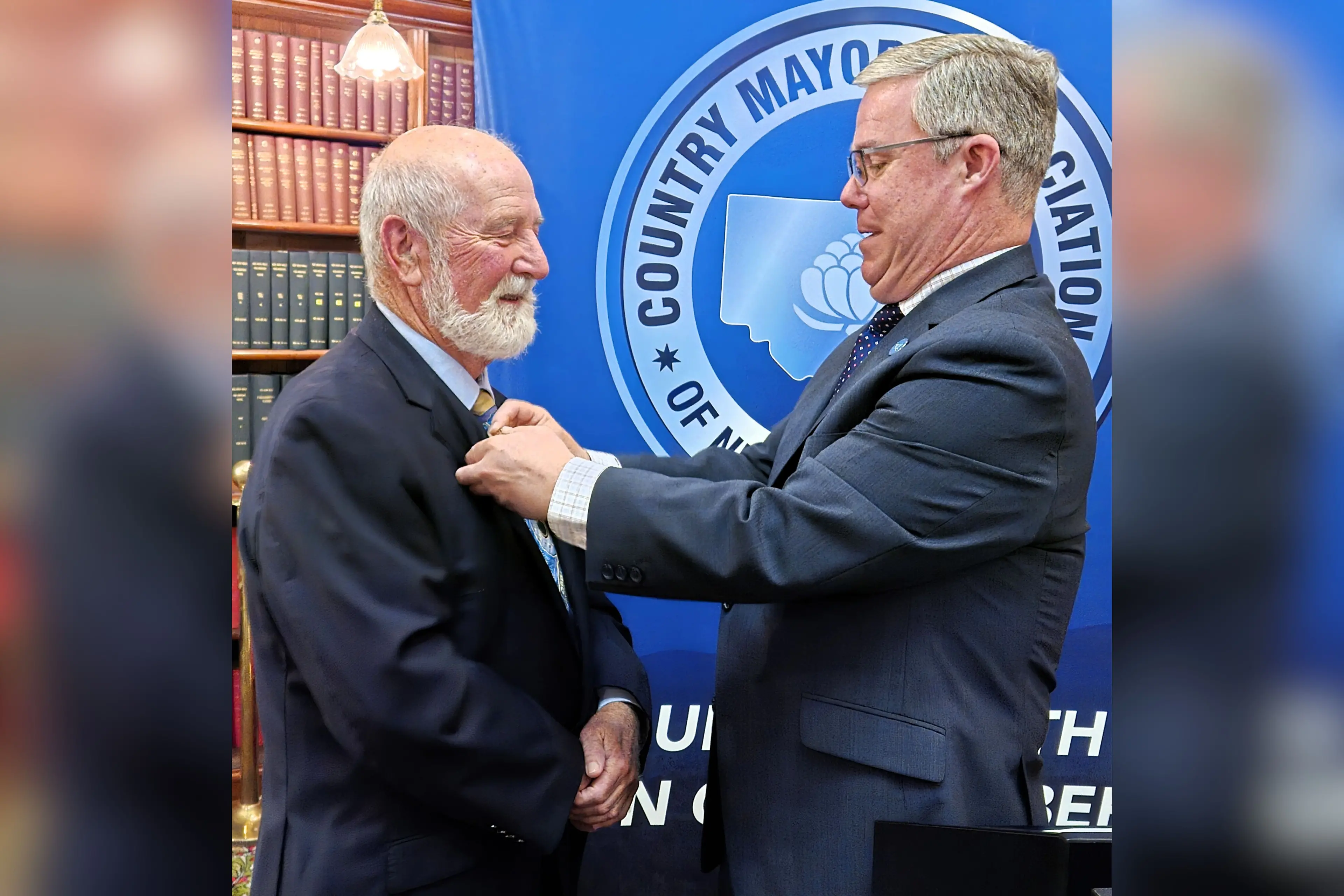<p>Former Parkes Shire mayor Ken Keith OAM receives his honour of patron from the current CMA chair Mayor Rick Firman OAM of Temora Shire.</p>\\n