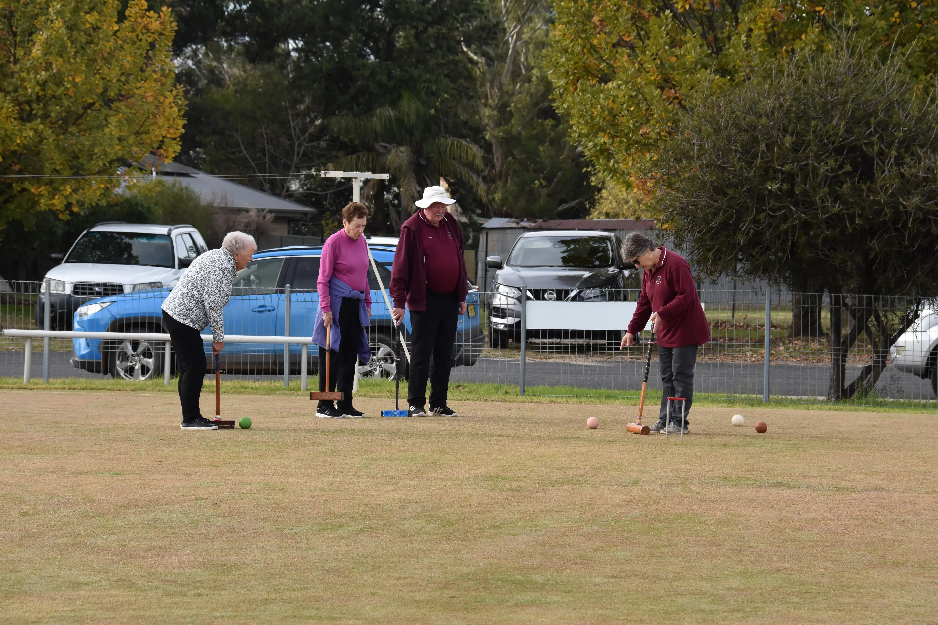 <p>New and returning players tried their hand at croquet. PHOTO: Rheannon Watts</p>\\n