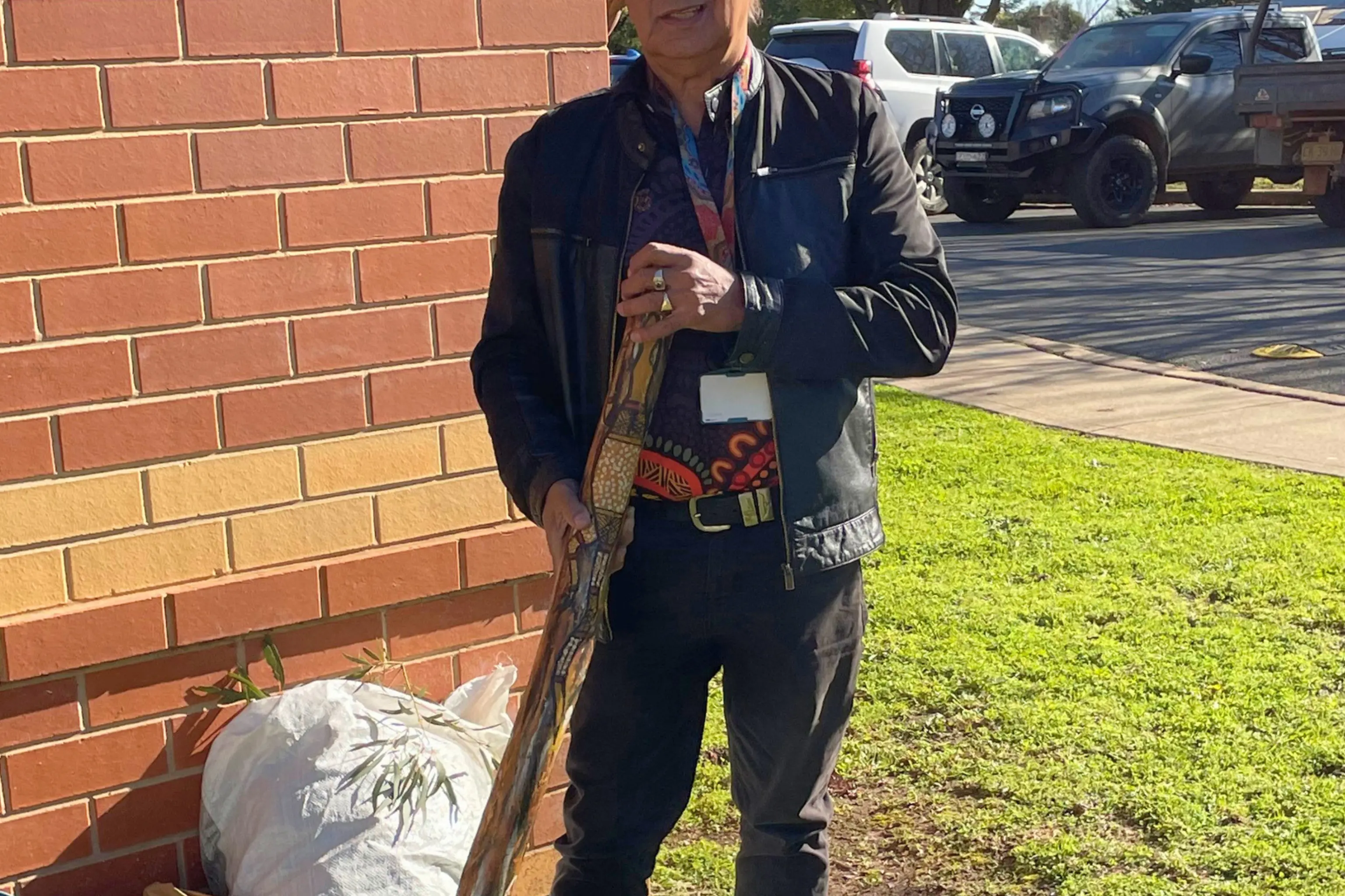 <p>Murrumbidgee Local Health District Aboriginal Health Liaison Officer Len Connolly prepares with his didgeridoo before leading the Smoking Ceremony at Young District Hospital as part of NAIDOC Week celebrations.</p>\\n