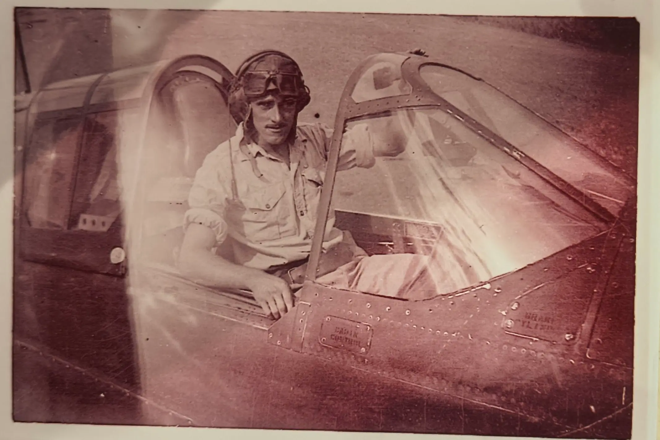 <p>Flying Officer Alf Stuart in the cockpit of his P40 Kittyhawk at Milne Bay. PHOTOS: supplied </p>\\n