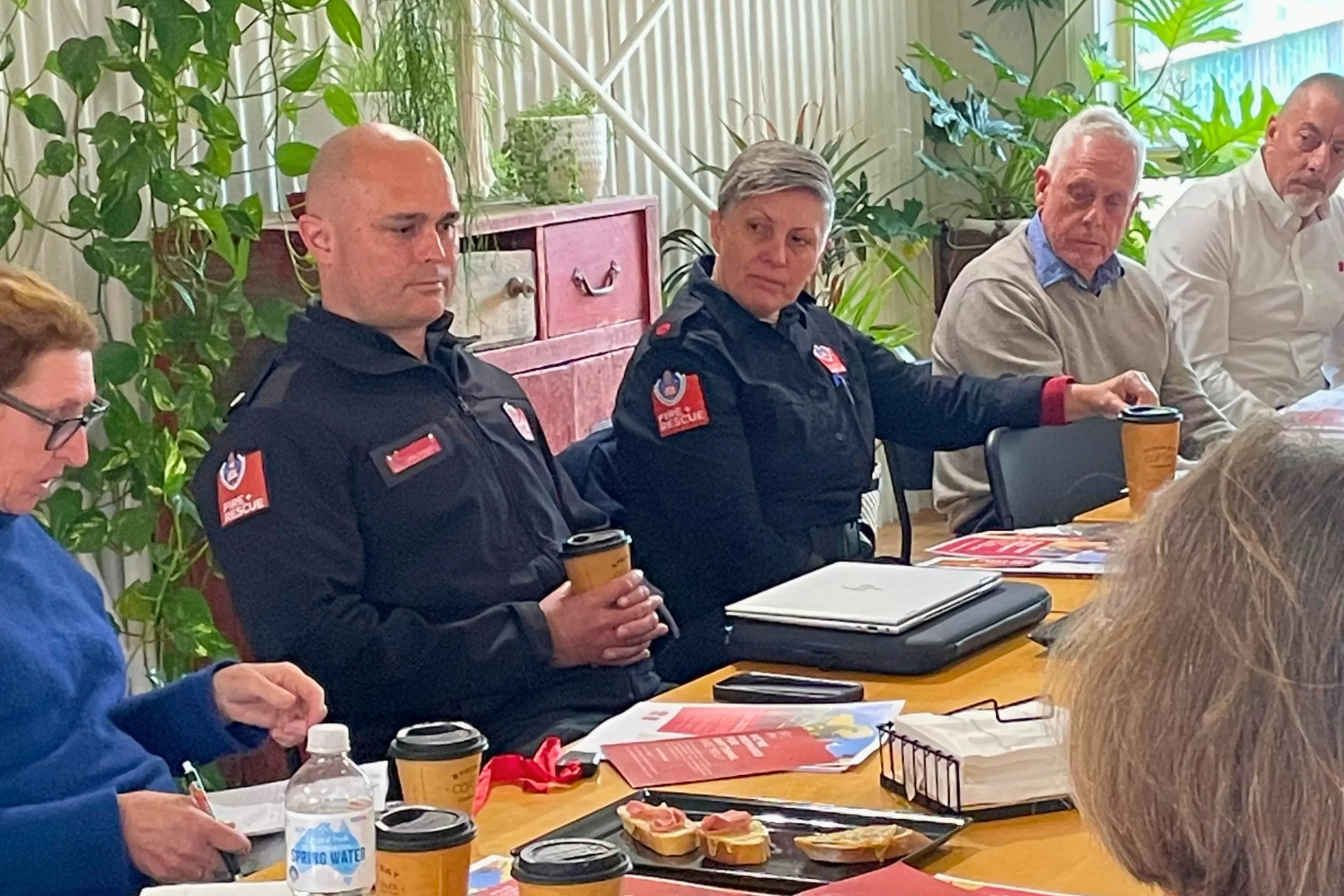 <p>Fire and Rescue NSW Southern Highlands Duty Commander Inspector Joel Pooley and Moss Vale Deputy Captain Charmaine Roth speak with members of the Boorowa Business Chamber at a Business over Breakfast meeting at The Bakery Boorowa.</p>\\n