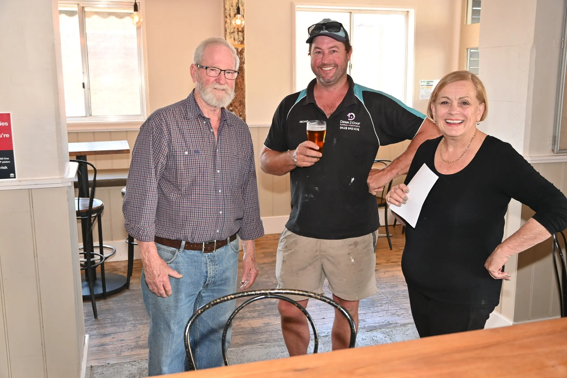 <p>Les McGown (left) and Rae Barlow (right) welcome first customer Mick Dawe. PHOTOS: Supplied</p>\\n